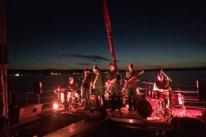 A band playing on the Nauti-Cat