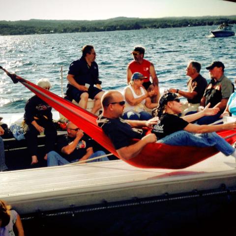 A group enjoying themselves on the Nauti-Cat in a hammock