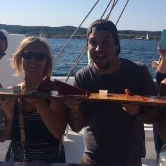 a group doing shotskis on the Nauti-Cat